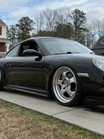 Fiberglass Porsche 997 Mach II Side Skirts for Carrera and GT3 Narrow Body by BetterBodies Motorsport, showing sleek rocker panels.