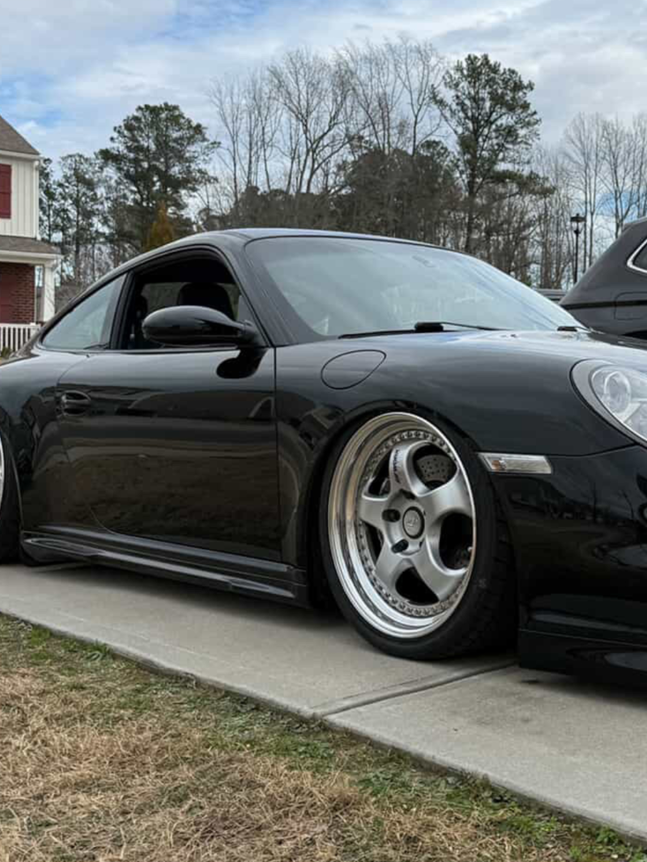 Fiberglass Porsche 997 Mach II Side Skirts for Carrera and GT3 Narrow Body by BetterBodies Motorsport, showing sleek rocker panels.