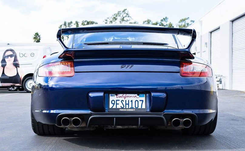 Blue Porsche 997.1 Aero Kit rear diffuser by BetterBodies Motorsport, featuring sleek design for 2005-2008 911 model.