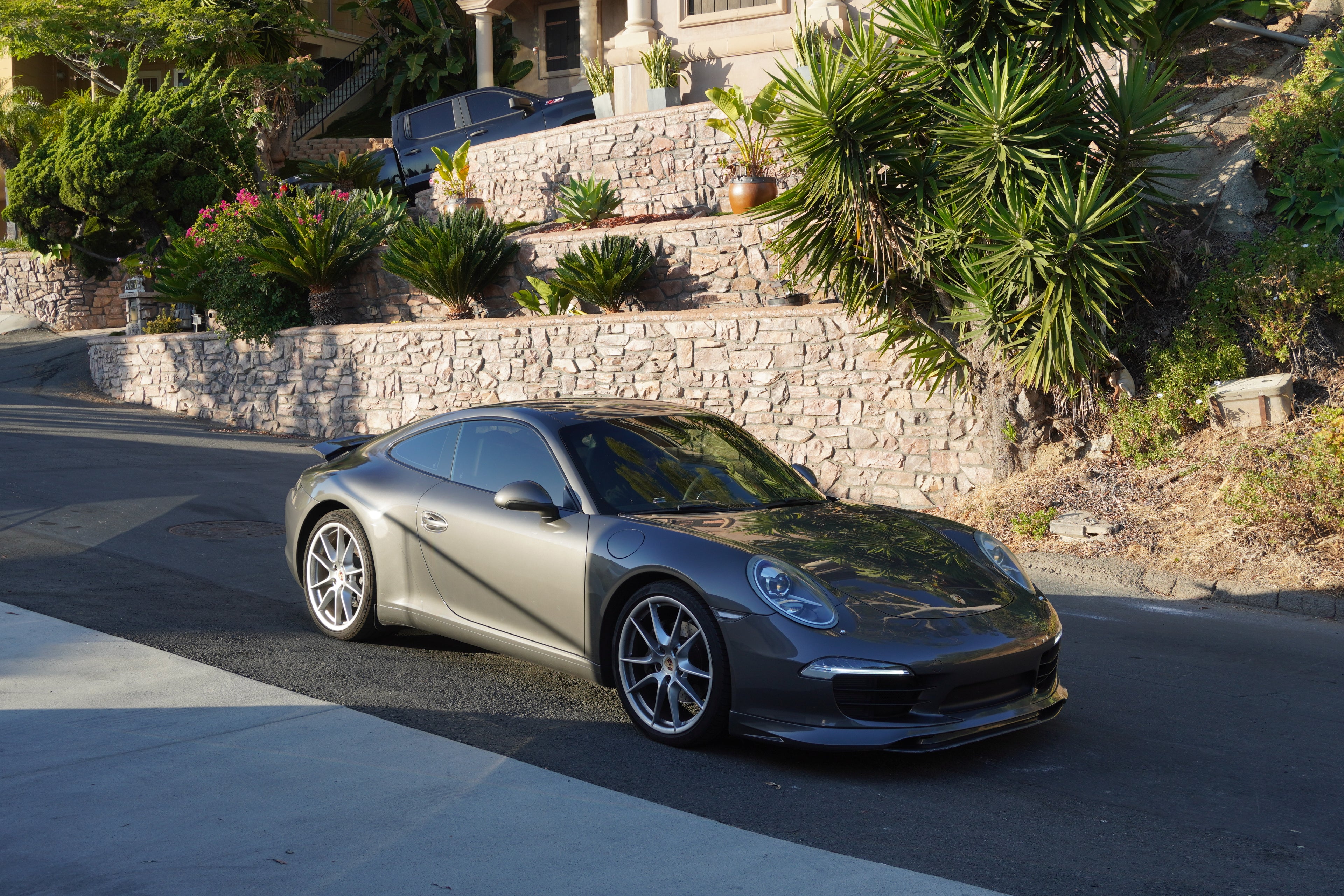 Porsche 991 Carrera Euro GT chin spoiler front lip splitter in polyurethane for 2012-2015 models, installed on front bumper.