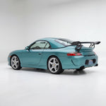 Rear bumper for Porsche 996 Carrera GT3 RS style with 997 look, made by BetterBodies Motorsport, showing the bumper's design and fit.