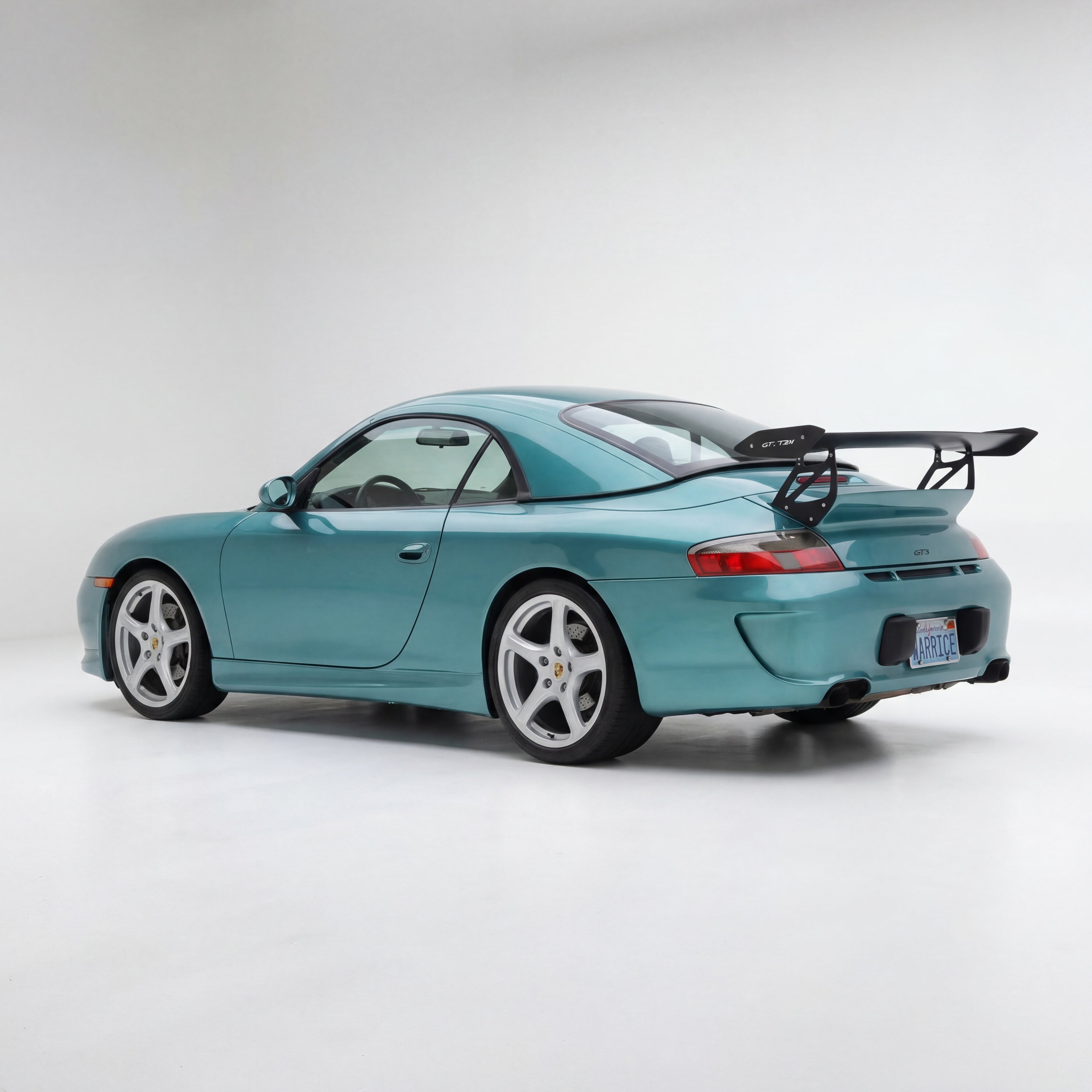 Rear bumper for Porsche 996 Carrera GT3 RS style with 997 look, made by BetterBodies Motorsport, showing the bumper's design and fit.