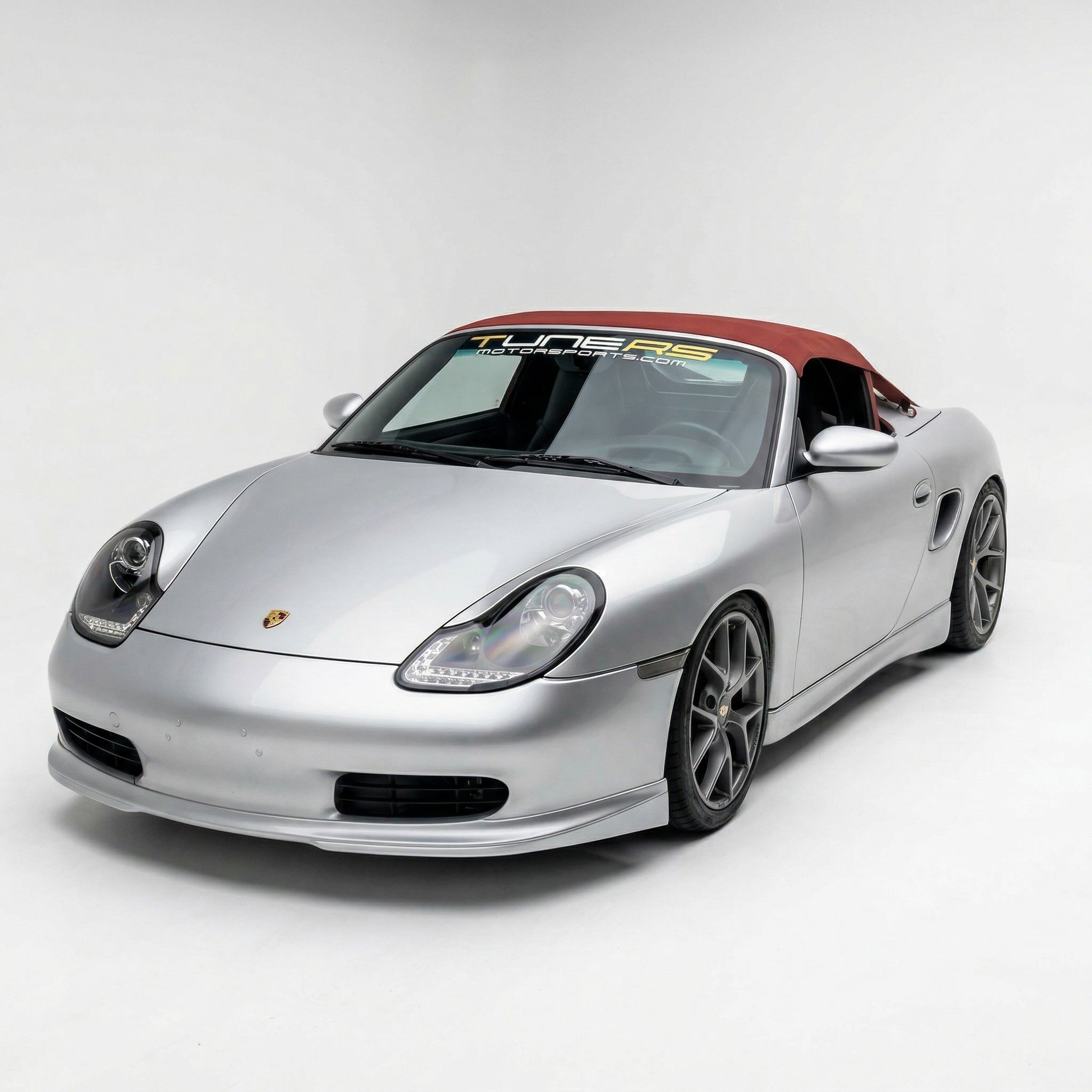 BetterBodies Motorsport Porsche 986 Boxster front chin spoiler in RUF/GT3 RS Spyder style lip, mounted on the vehicle.