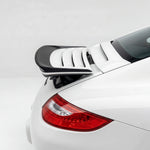 BetterBodies Motorsport Porsche 997 Carrera GT3TEK polyurethane rear wing ducktail spoiler on a sports car.