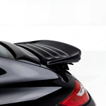 Porsche 997 Carrera GT3TEK rear wing by BetterBodies Motorsport, polyurethane ducktail spoiler on a sports car, close-up view.