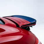 Porsche 997 Carrera GT3TEK rear wing polyurethane ducktail spoiler on a sports car, designed for improved aerodynamics and style.