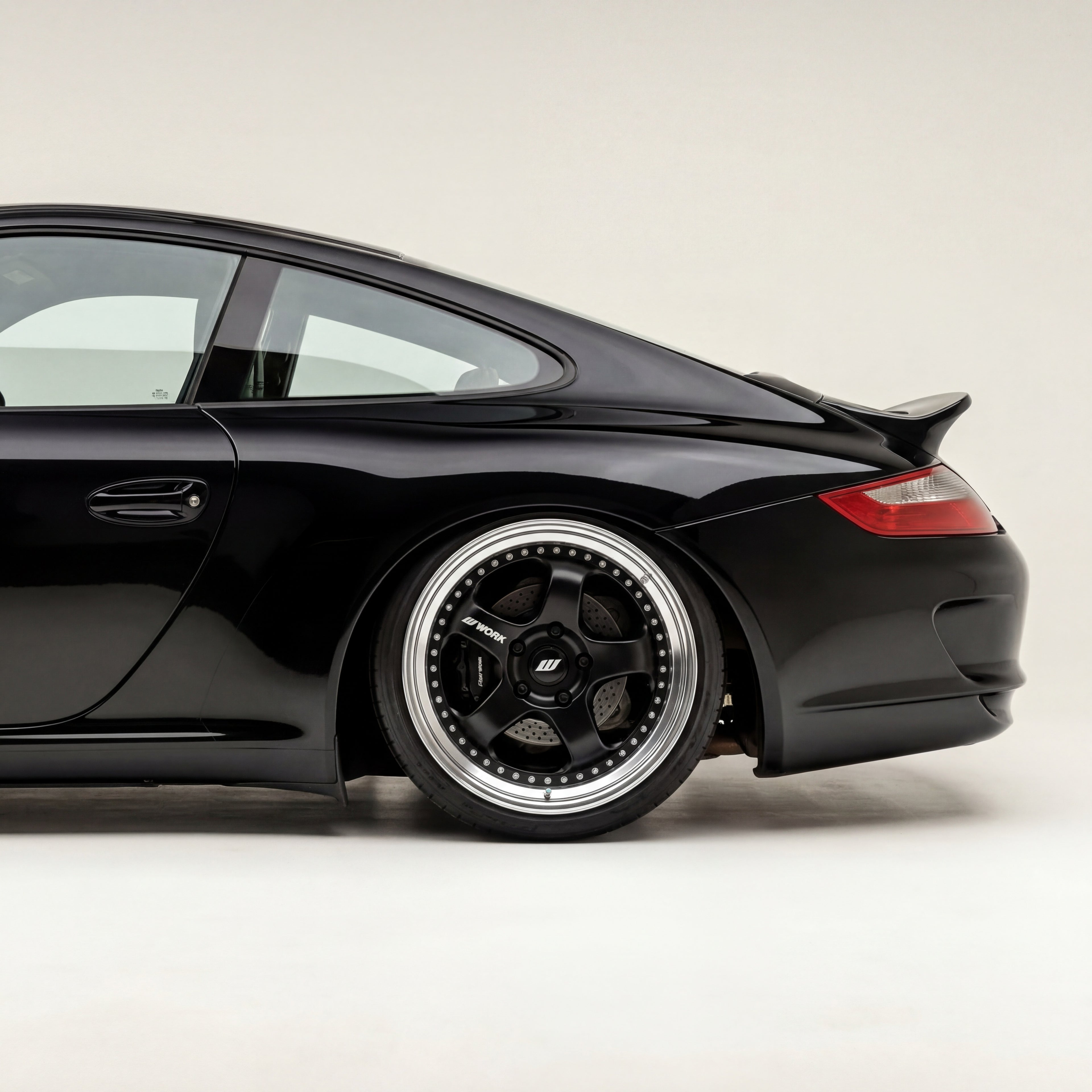 Fiberglass Porsche 997 Carrera wing with bolt-on ducktail spoiler, racing upgrade by BetterBodies Motorsport for 2005-2012 models
