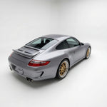 Fiberglass Porsche 997 Carrera ducktail spoiler wing by BetterBodies Motorsport, designed for 2005-2012 911 models.