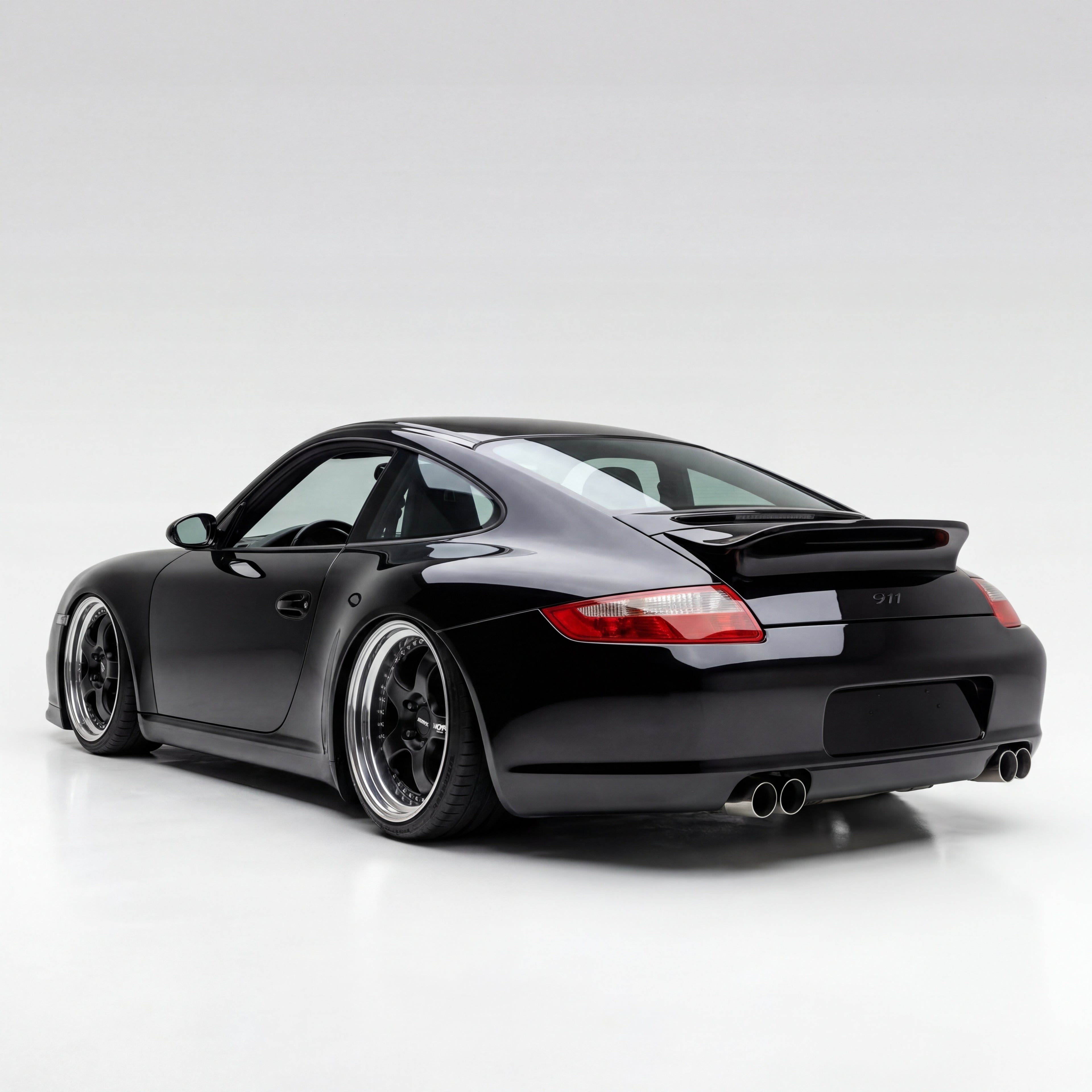 Fiberglass Porsche 997 Carrera ducktail spoiler by BetterBodies Motorsport, designed for 2005-2012 911 models, racing upgrade wing.