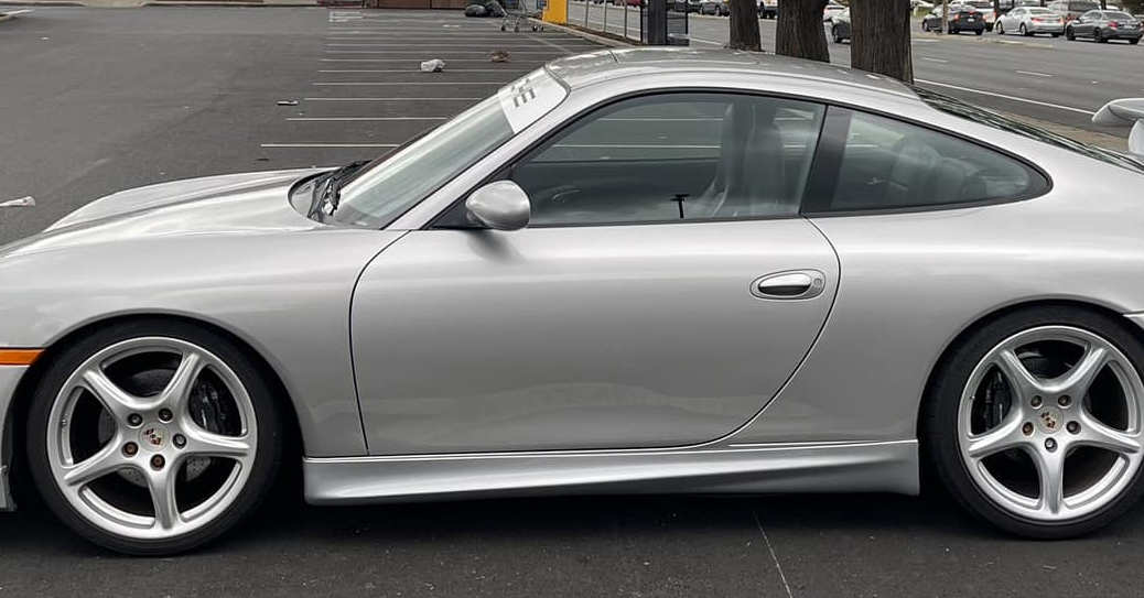 BetterBodies Motorsport polyurethane Porsche 996.1 Aero II front lip and GT3 RS side skirts kit for 1999–2001 models.