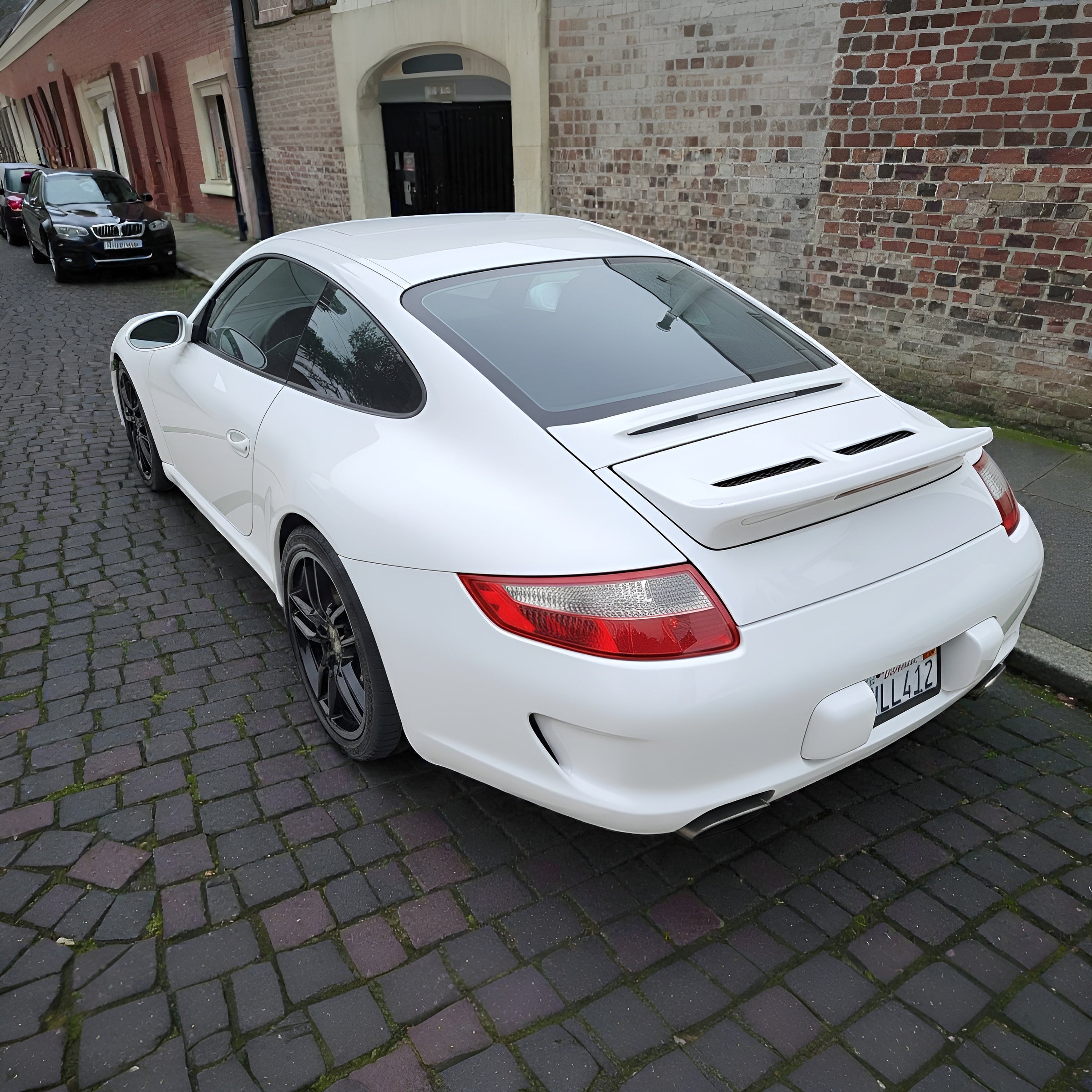 Porsche 997 Carrera Bolt-On Ducktail Spoiler – Fiberglass Racing Upgrade (2005–2012)