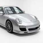 Porsche 997.2 GT3-style polyurethane front lip spoiler, installed on the front of a 2009–2012 model 911.