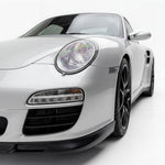 Polyurethane GT3-style front lip spoiler for Porsche 997.2 (2009-2012), designed for improved aerodynamics and sporty appearance.