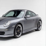 Porsche 997 Carrera narrow body side rockers by BetterBodies Motorsport featuring polyurethane aero skirts, installed on a 2005–2011 model.