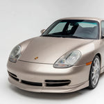 Porsche 996 GT3-style front spoiler lip in polyurethane by BetterBodies Motorsport for 1998-2001 996 models, designed for enhanced aerodynamics.
