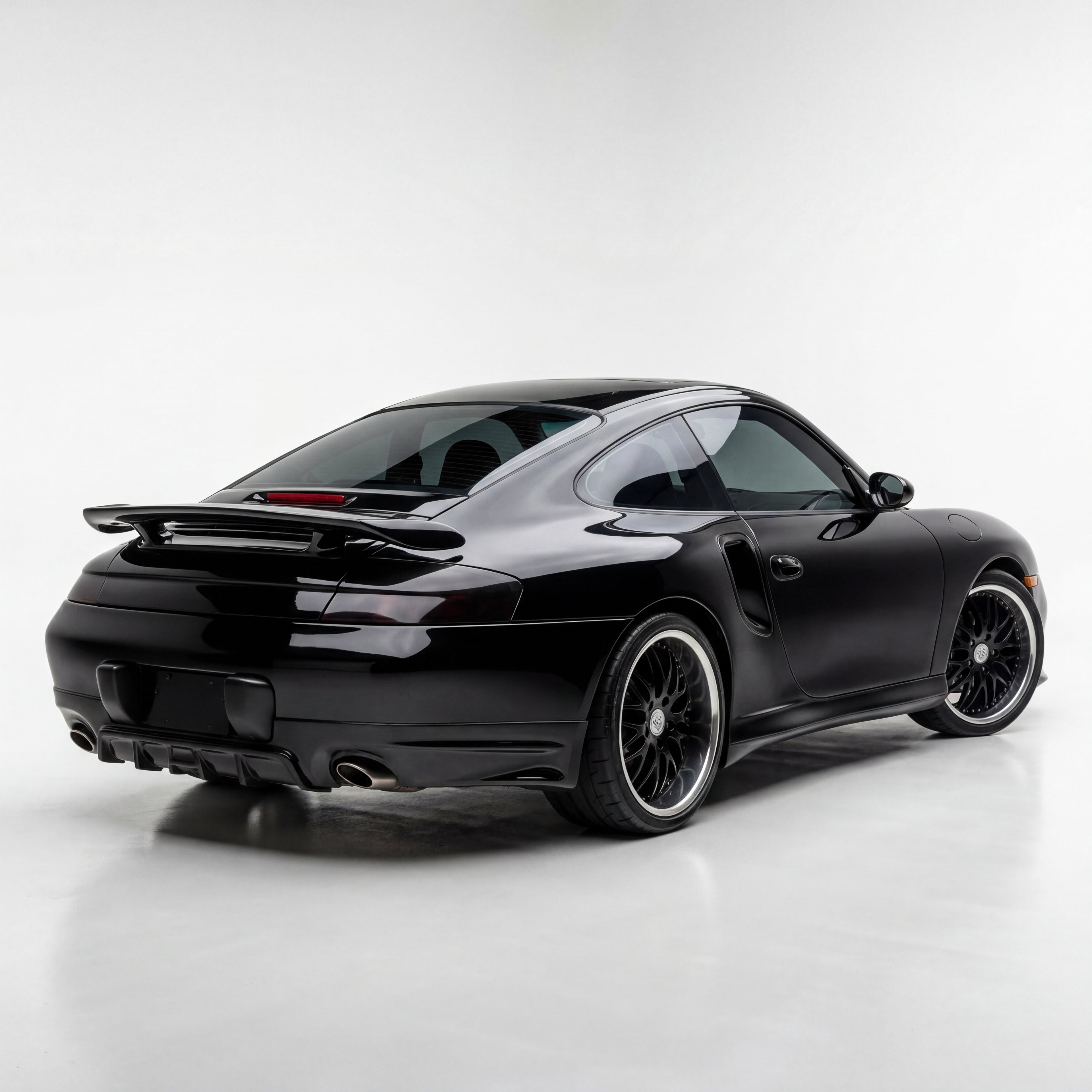 BetterBodies Motorsport Porsche 996.1 Carrera rear bumper diffuser in racing style upgrade for 1999–2001 models, remove license plate