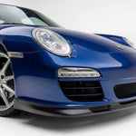 Polyurethane GT3-style front lip spoiler for Porsche 997.2, 2009–2012, by BetterBodies Motorsport, shown mounted on car.