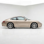 Polyurethane Porsche 996 GT3-style front spoiler lip by BetterBodies Motorsport for 1998-2001 911 models, shown on a vehicle.