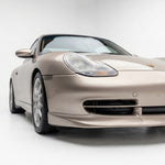Black polyurethane Porsche 996 GT3-style front spoiler lip for 1998–2001 996 models, designed for improved aerodynamics.