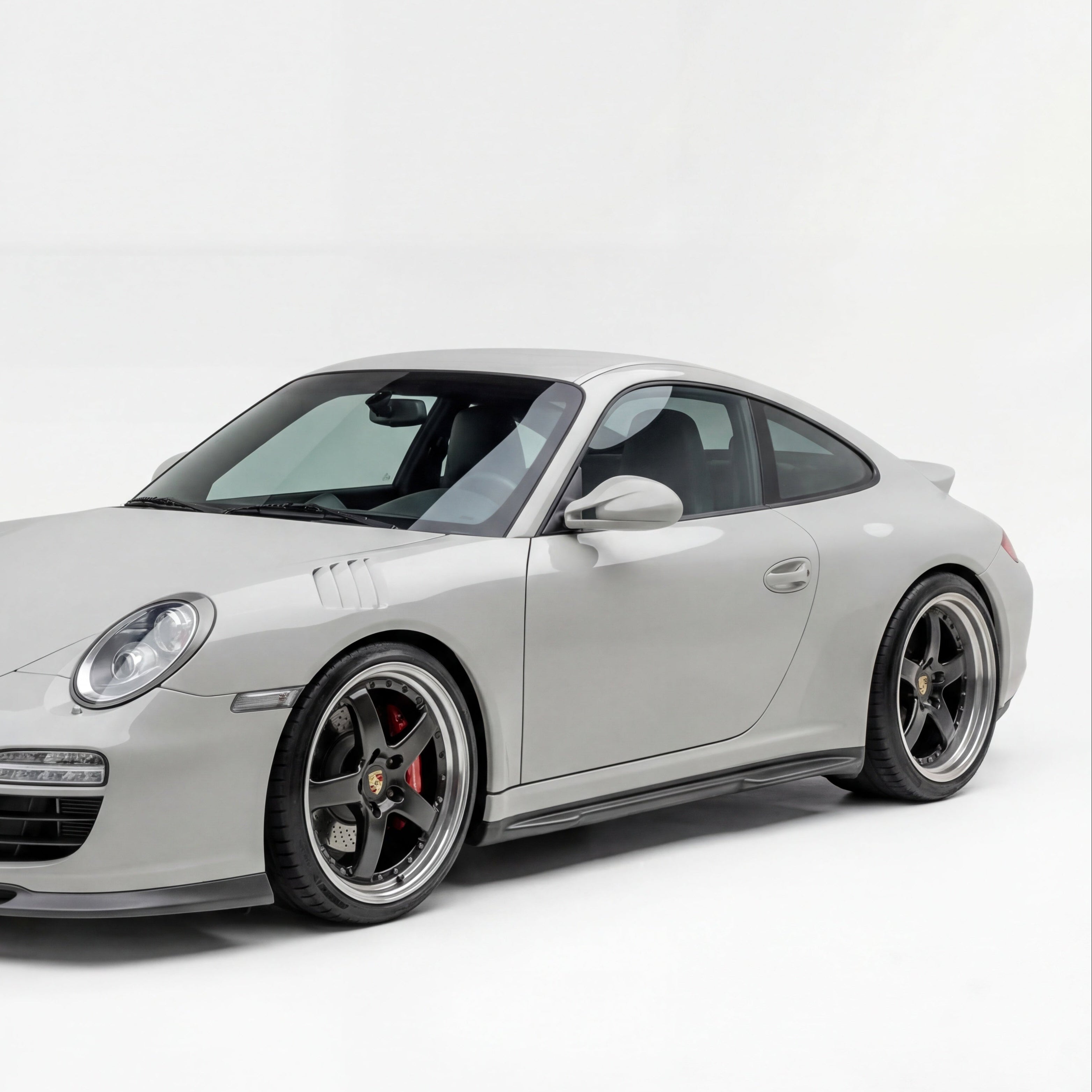 Polyurethane side skirts for 2005-2012 Porsche 997 Carrera Mach II Narrow Body by BetterBodies Motorsport, featuring a sleek, aerodynamic design.