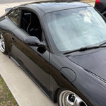 Polyurethane side skirts for Porsche 997 Carrera Mach II narrow body, 2005–2012, by BetterBodies Motorsport, shown on a transparent background.